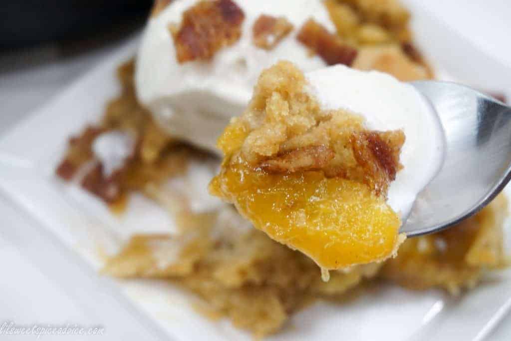 Jalapeño Candied Bacon Peach Cobbler--This is not your grandmother's peach cobbler. This double crust peach cobbler gets a lil' kick from diced jalapeño and a little smokey, crunchiness in the topping from the candied bacon.--lilsweetspiceadvice.com