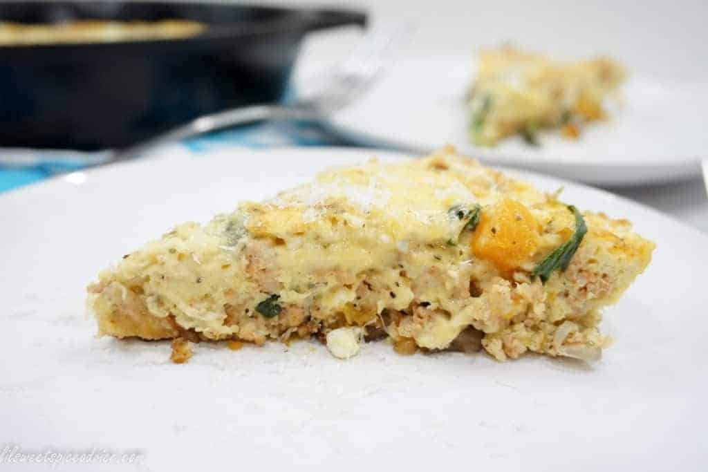 Chicken Sausage, Kale, & Butternut Squash Frittata -- Hot Italian chicken sausage combines with sauteed baby kale and roasted butternut squash in a cheesy and creamy frittata base. -- lilsweetspiceadvice.com