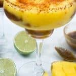 Mangonada Margaritas--Mangonada and margaritas have finally joined together in holy matrimony! Homemade organic chamoy sauce, frozen mangoes, and chili lime seasoning are combined to make a twist on the classic frozen margarita.--lilsweetspiceadvice.com