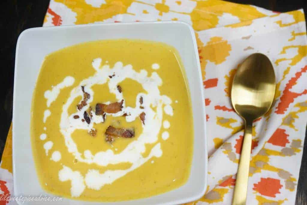 Roasted Pumpkin Soup -- Freshly roasted pie (sugar) pumpkin deserves some spotlight in a delightfully creamy soup topped with crispy bacon. -- lilsweetspiceadvice.com #roastedpumpkin #pumpkinsoup #creamysoup