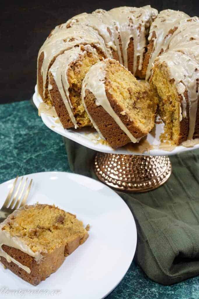 Sweet Potato Cinnamon Streusel Bundt Cake with Brown Sugar Bourbon Glaze-- This cake is sure to please your Thanksgiving and holiday guests with the flavors of fall and super moistness thanks to the mashed sweet potatoes. -- lilsweetspiceadvice.com #sweetpotatocake #bundtcake #holidaybundtcake 