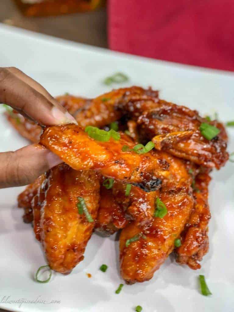 Sweet Heat Bourbon Chicken Wings-- Looking for the perfect wings for the Super Bowl? These Sweet Heat Bourbon Wings are the perfect balance between sweet and heat! They bake up perfectly crispy. -- lilsweetspiceadvice.com