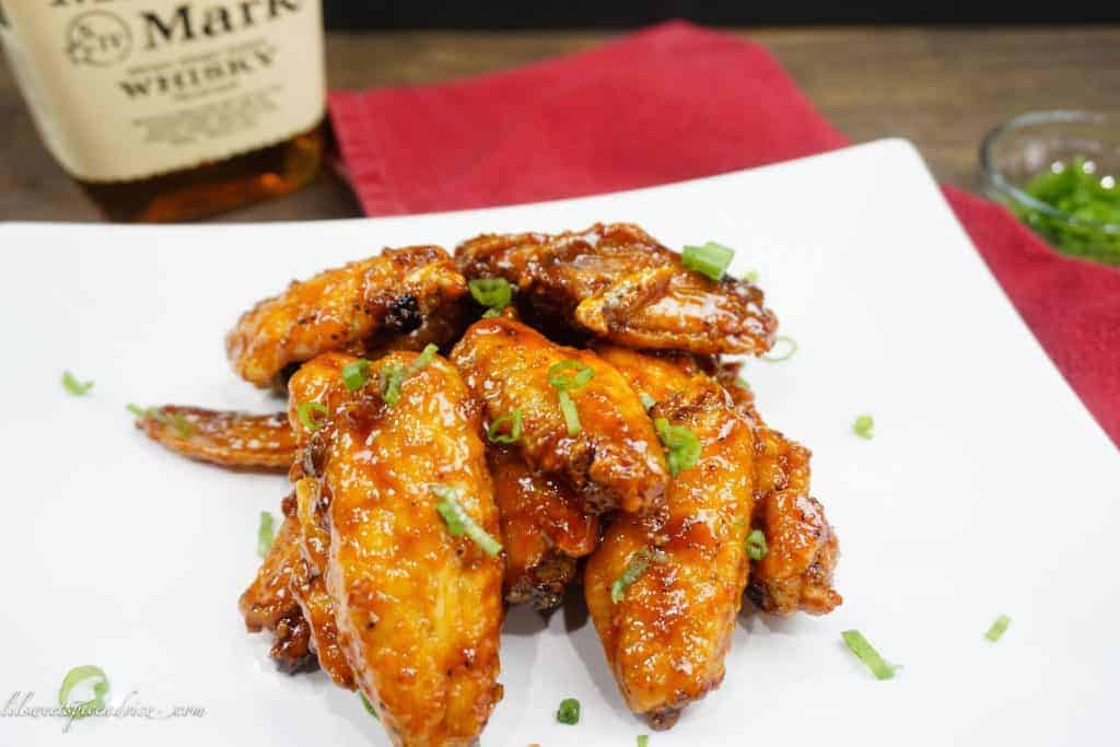 Sweet Heat Bourbon Chicken Wings-- Looking for the perfect wings for the Super Bowl? These Sweet Heat Bourbon Wings are the perfect balance between sweet and heat! They bake up perfectly crispy. -- lilsweetspiceadvice.com