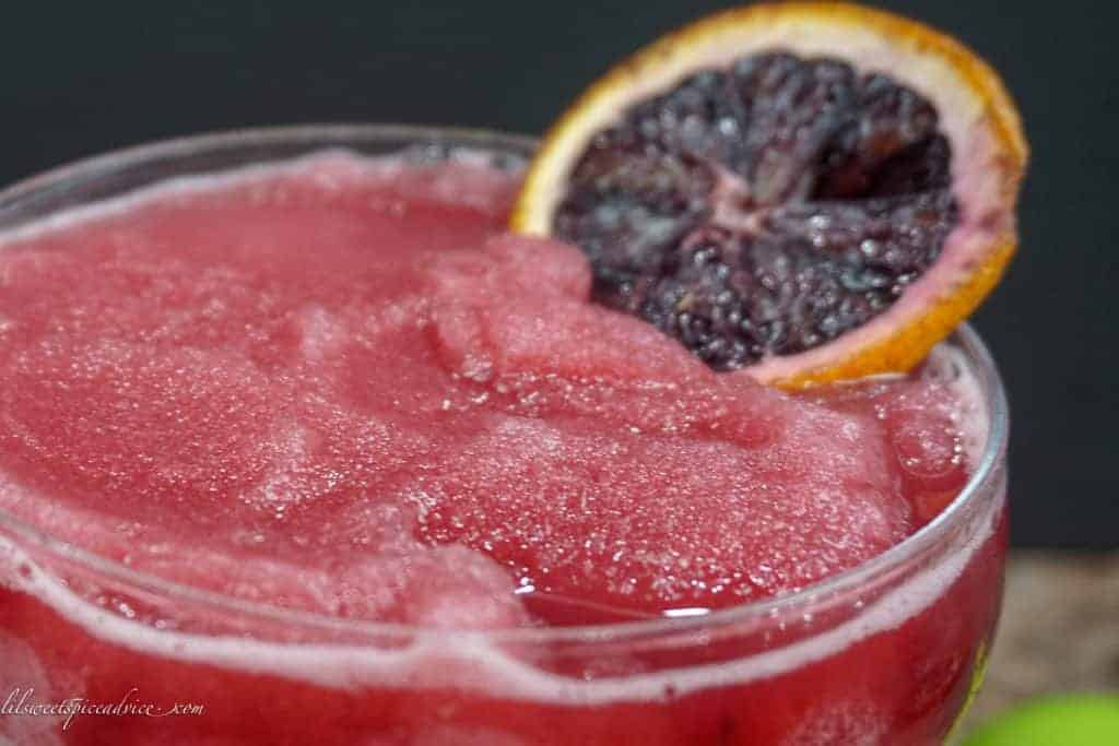 Frozen Vanilla Blood Orange Daiquiri -- This Frozen Vanilla Blood Orange Daiquiri screams spring/summer. It has an unexpected addition of Chambord which perfectly complements the raspberry notes in the blood oranges. --lilsweetspiceadvice.com #bloodoranges #frozendaiquiri #bloodorangedaiquiri #orangedaiquiri