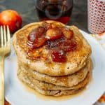 Cinnamon Vanilla Whole Wheat Pancakes with Homemade Plum Syrup -- The perfect fluffy and crispy whole wheat pancakes to satisfy all of your guests. Top the pancakes with the homemade plum syrup and you'll think you've transported to heaven! -- lilsweetspiceadvice.com #wholewheatpancakes #crispypancakes #homemadesyrup #cinnamonpancakes