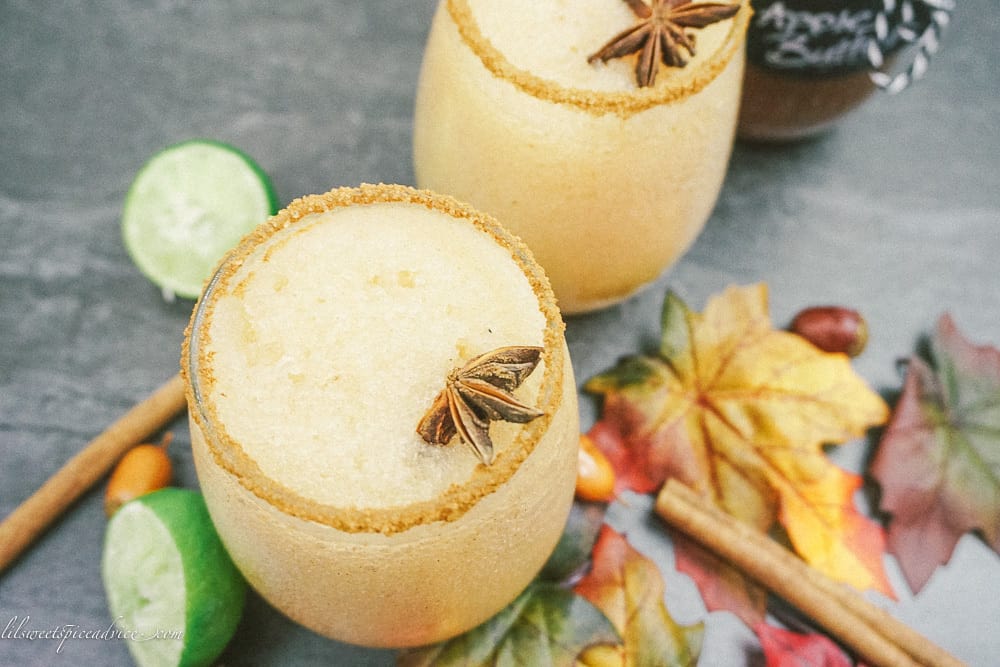 Frozen Apple Butter Margaritas -- Apple butter and apple cider get blended together in this festive and tasty Frozen Apple Butter Margarita! -- lilsweetspiceadvice.com #frozenapplebuttermargaritas #frozenapplemargaritas #applemargaritas #applebuttercocktails