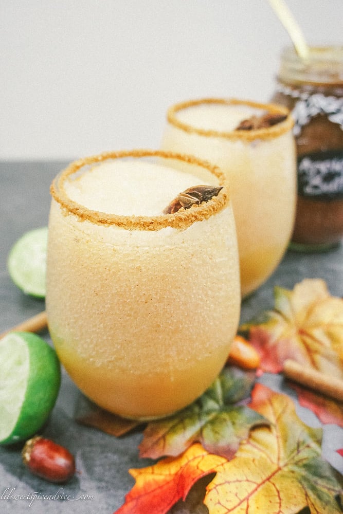 Frozen Apple Butter Margaritas -- Apple butter and apple cider get blended together in this festive and tasty Frozen Apple Butter Margarita! -- lilsweetspiceadvice.com #frozenapplebuttermargaritas #frozenapplemargaritas #applemargaritas #applebuttercocktails