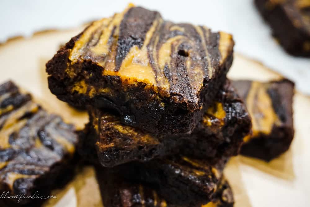 Gluten-Free Marbled Sweet Potato Brownies -- These super fudgy and moist gluten-free marbled sweet potato brownies taste like the holiday season. Your holiday table deserves these gluten-free brownies! -- lilsweetspiceadvice.com #glutenfreebrownies #gffudgebrownies #sweetpotatobrownies #fudgebrownies